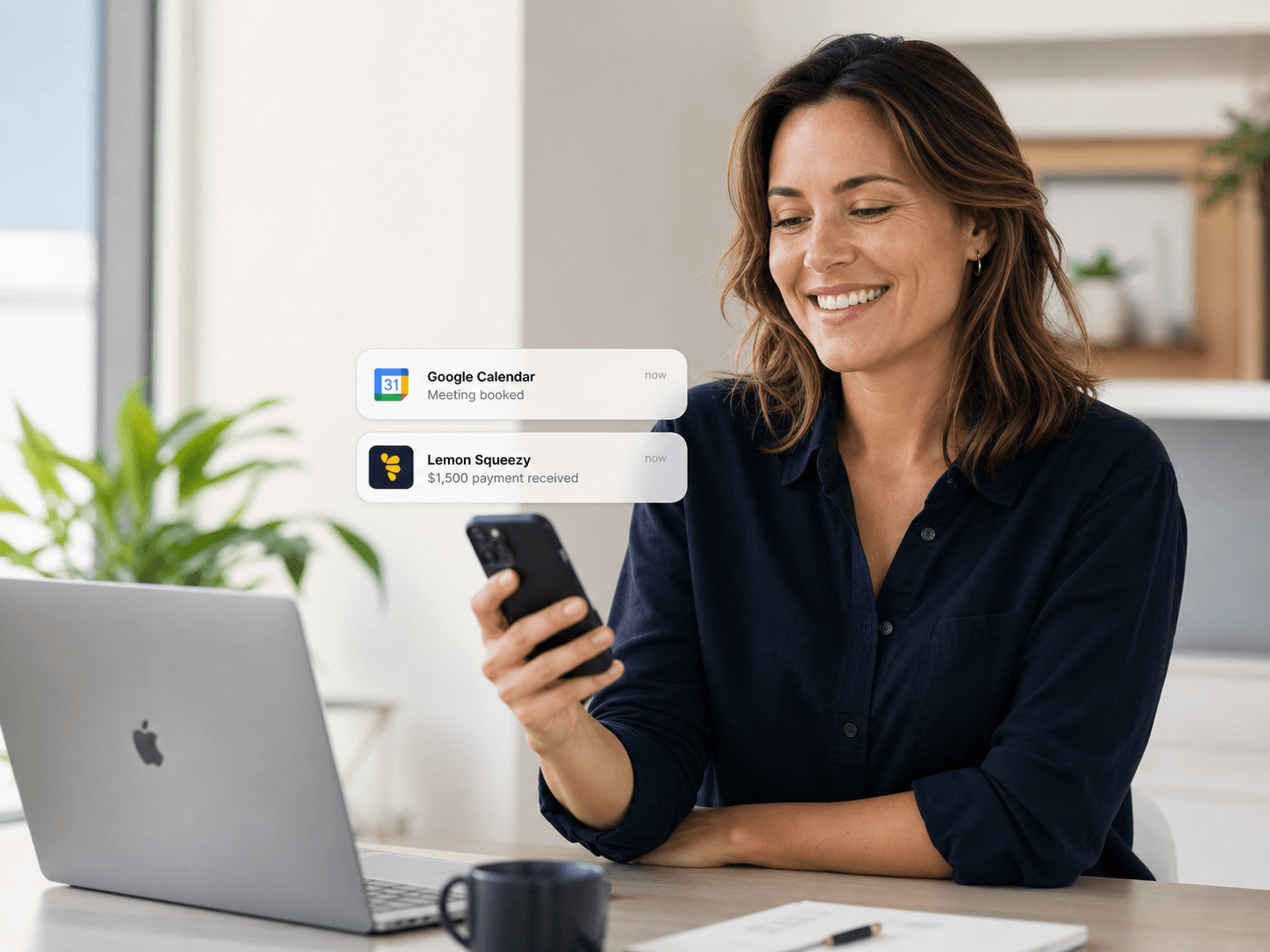 Professional woman viewing Google Calendar and Lemon Squeezy launch notifications on her iPhone.